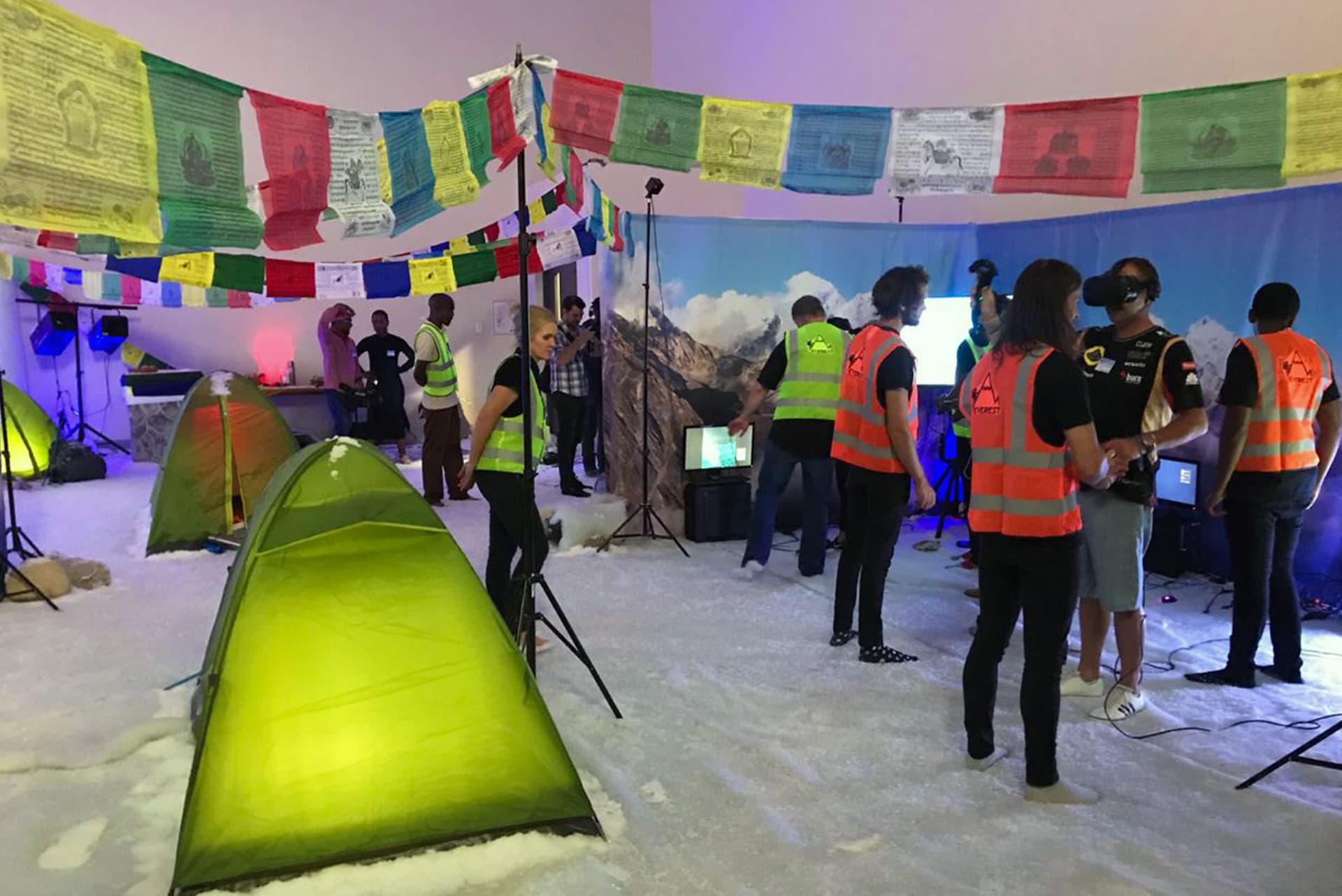 Participants exploring virtual reality at a media event