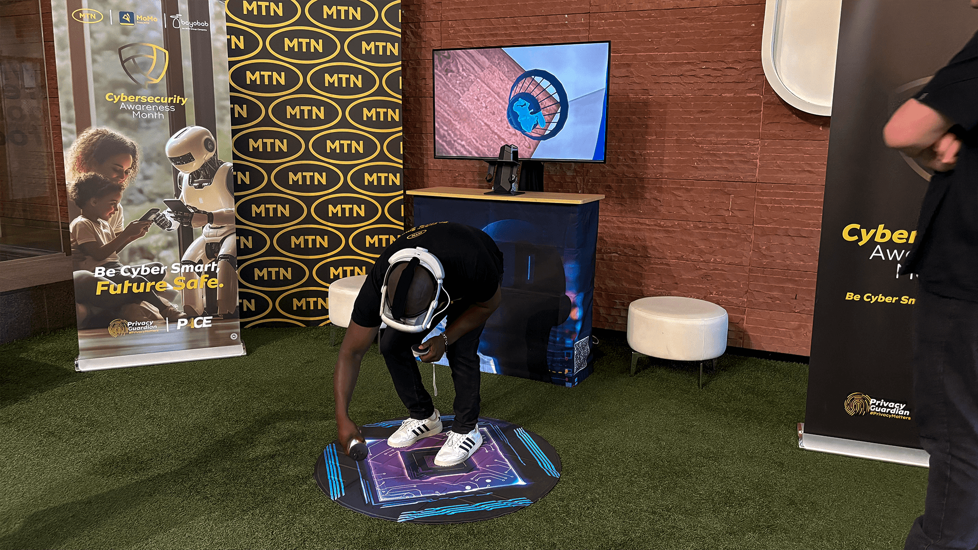 A participant leaning forward during an interactive VR challenge