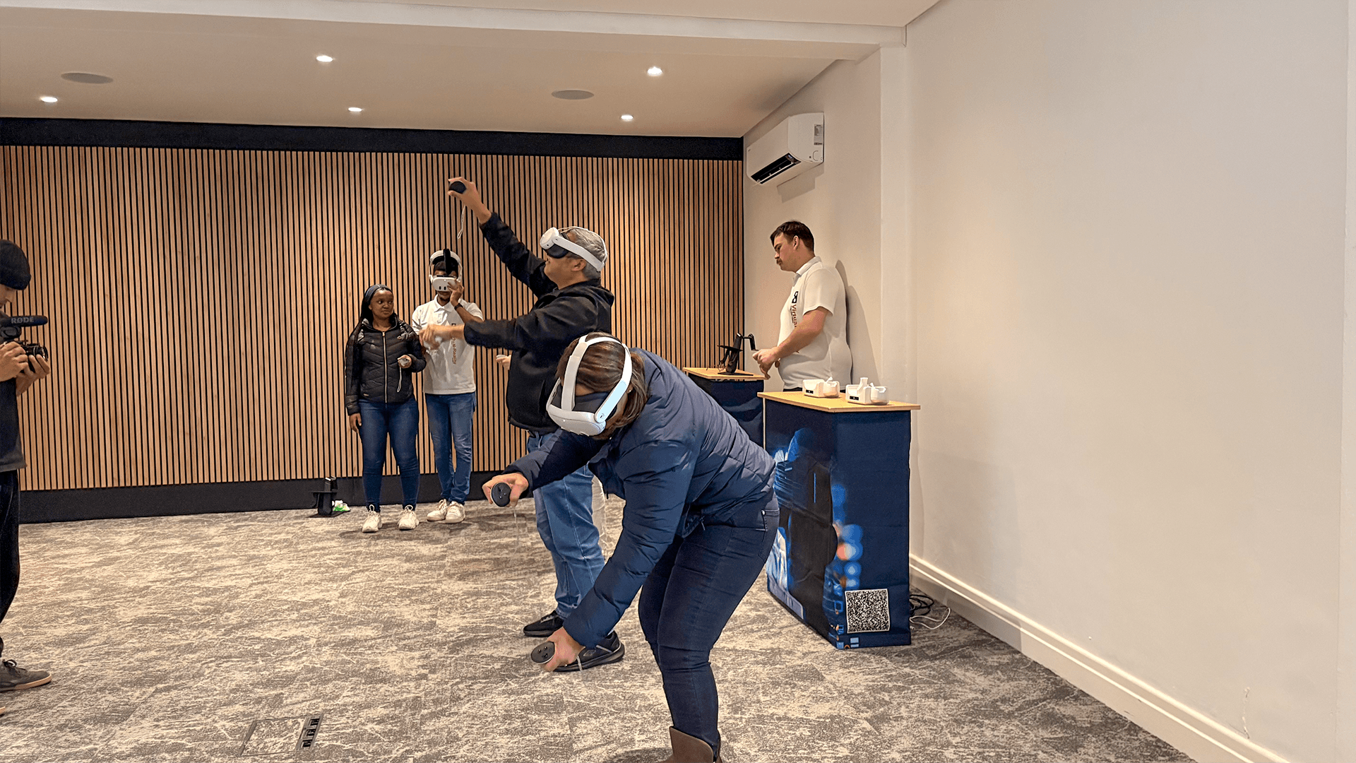 A participant leaning forward while interacting with a VR experience
