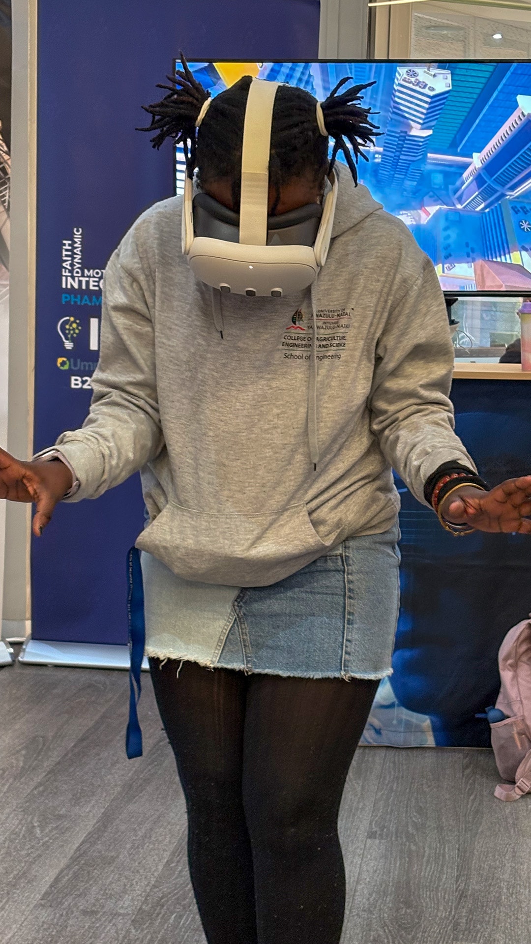 A guest leaning forward while wearing a VR headset at a demonstration
